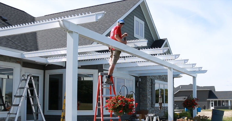 Can you build a pergola next to a neighbor's fence? 6 rules from legal experts