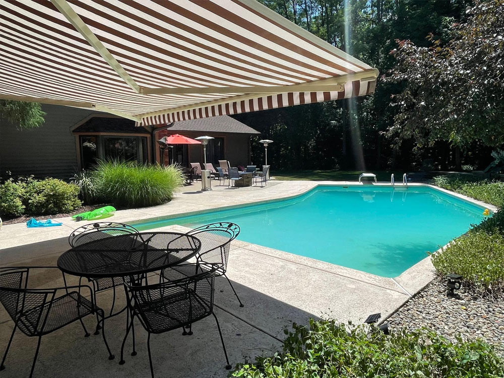 retractable awning swimming pool